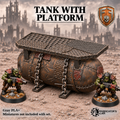 Painted example of a Greenskin tank with an overhead metal platform and chain details; miniatures shown for scale. Supplied unpainted in Gray PLA+.